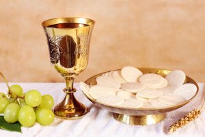 Chalice of wine and a Ciboria with the Communion